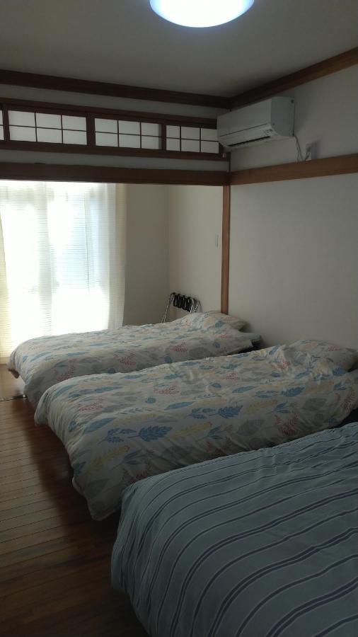 Hotel Kami House à Amami Chambre photo