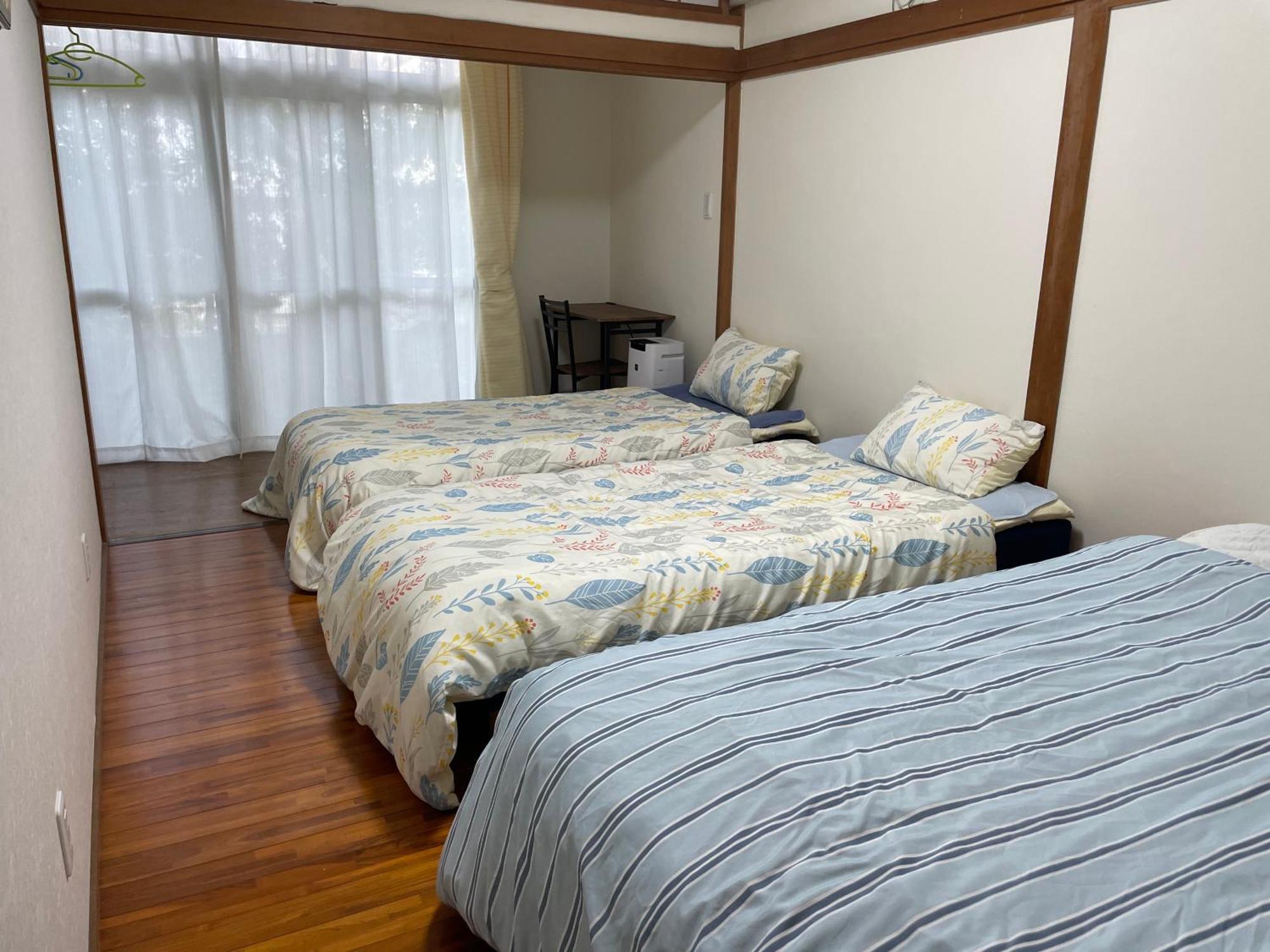 Hotel Kami House à Amami Extérieur photo